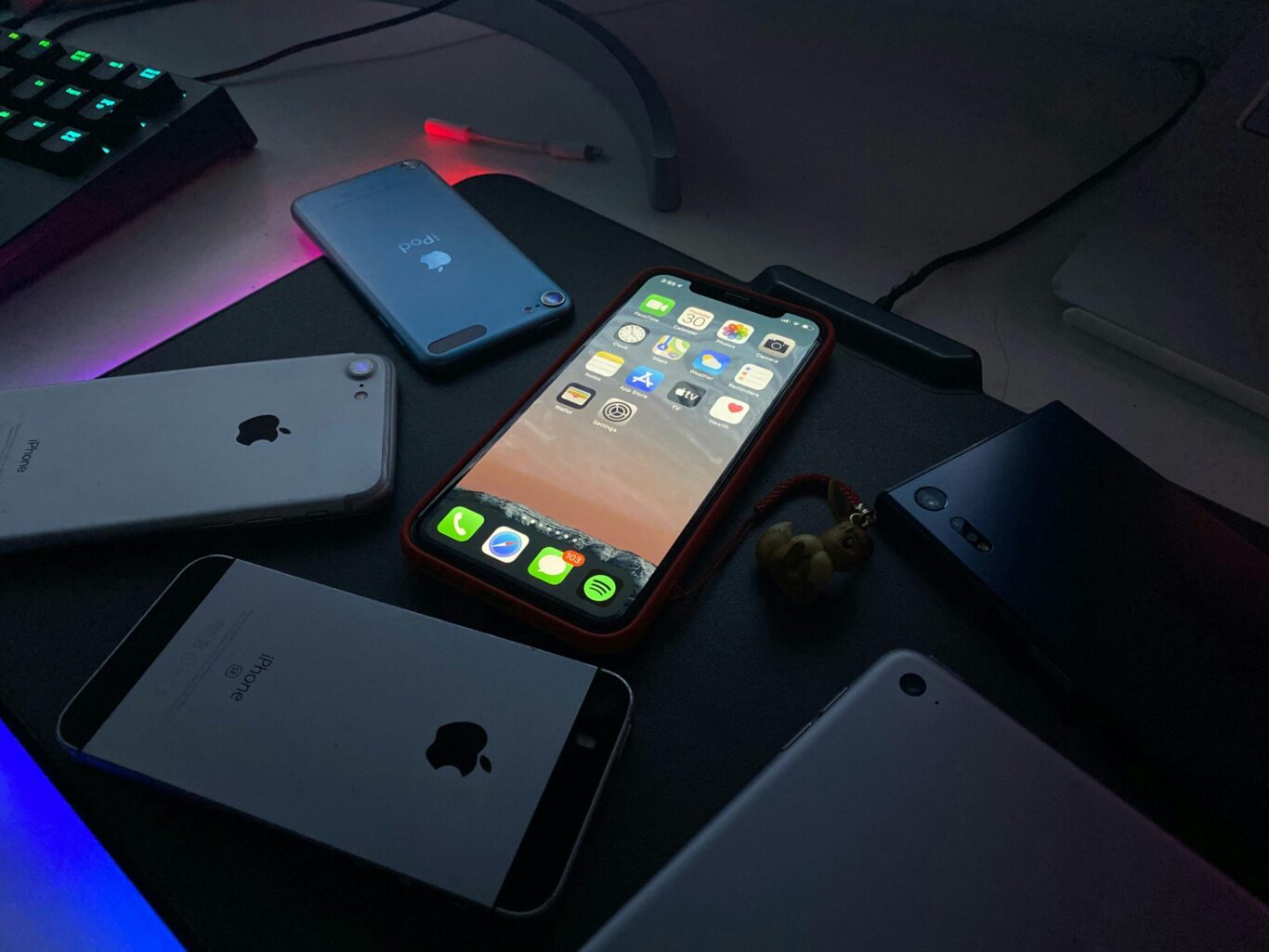 group of iphones on desk